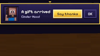 A card at the top of the screen: A gift arrived, Cinder Hood, with Say thanks and OK.